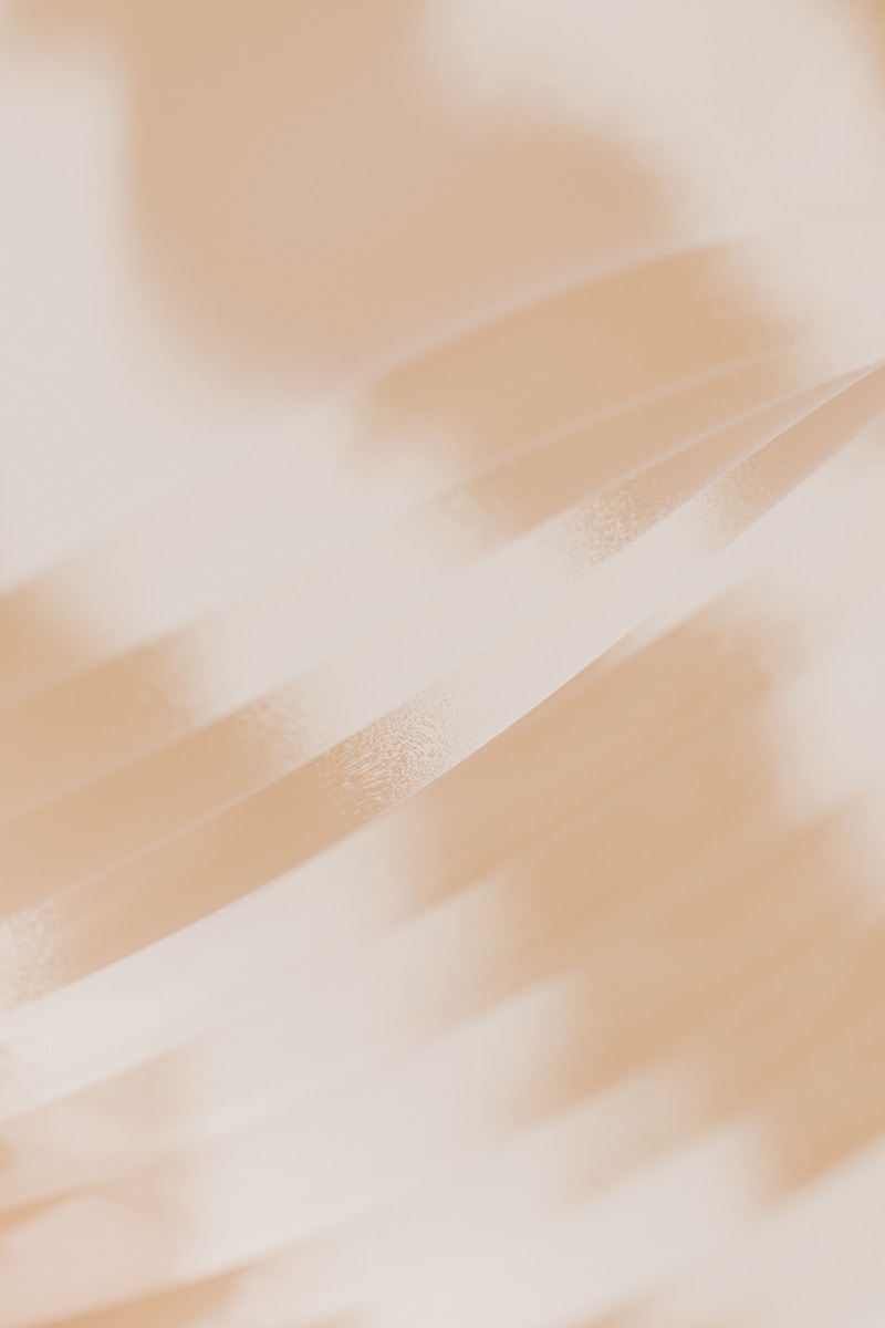 A blurry photo of a person holding a cell phone